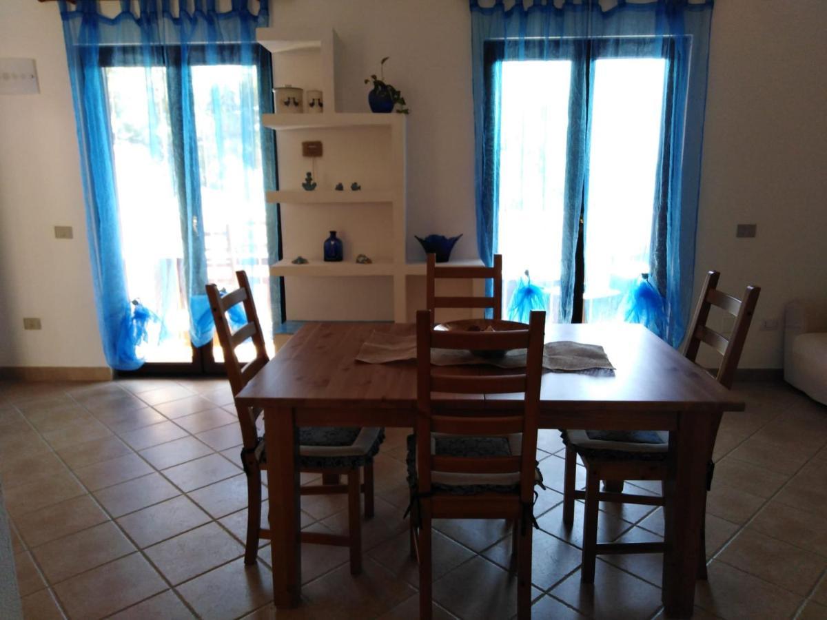 Villa Panoramica Immersa Nel Verde Porto Pino Exterior foto