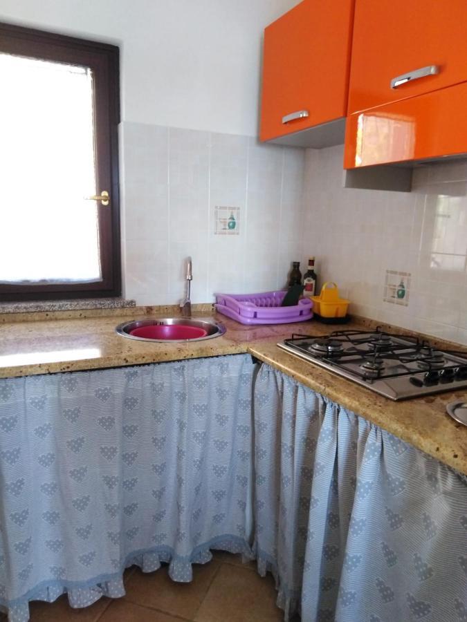Villa Panoramica Immersa Nel Verde Porto Pino Exterior foto